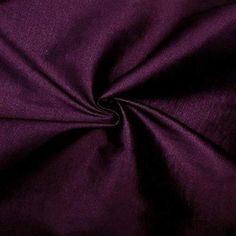 a close up view of a purple fabric