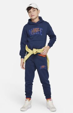 Heavyweight fleece made with soft cotton brings warm, cozy comfort to a kid-size hoodie that layers easily in the cold. 80% cotton, 20% polyester Machine wash, dry flat Imported Athletic Logo, Nike Sportswear Club Fleece, Kids Sportswear, Kids Club, Nike Kids, Fleece Joggers, Midnight Navy, Comforters Cozy, Nike Sportswear