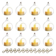 twelve glass baubles with an ornament hanging from the top and bottom