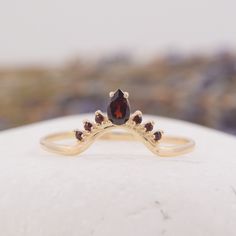 Art deco 14k yellow gold curved crown marquise garnet wedding band, Vintage V shaped tiara garnet womens wedding band, Chevron wedding band WE OFFER UNLIMITED PERIOD INSTALLMENTS PLAN This is a beautiful, stunning, feminine ring that works well for all occasions, styles, and ages. You will love it! Ring information: Stones: Garnets Approximate size: 5x3mm (1 stone) Approximate size: 1.25mm (6 stones) Approximate weight: 0.34ct ( in total) Approximate width of Band 1.3mm Metal type: Gold Metal st Yellow Gold Garnet Wedding Jewelry, Elegant Stackable Garnet Jewelry, Anniversary Jewelry With Teardrop Crown Prong Setting, Anniversary Teardrop Crown Jewelry With Prong Setting, Elegant Marquise Garnet Jewelry, Elegant Stackable Pear-shaped Jewelry, Elegant Pear-shaped Stackable Jewelry, Yellow Gold Teardrop Crown Jewelry For Wedding, Elegant Pear-shaped Garnet Jewelry