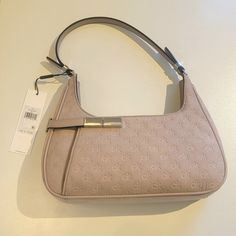 Calvin Klein Jade Signature Embossed Top Zipper Shoulder Bag Very Soft Lilac (Light Purple Pink) Color Lots Of Space Inside. I Love The Outside Buckle That Opens A Smaller Pocket On The Front Material: 100% Polyester Or Faux Suede; Trim: Polyester; Lining: Polyester Measurements: Small Size Bag, 11 5/8" W X 9" H X 1 3/4" D Strap Type: 9.75" Handle Drop Top Zipper Closure Exterior Details: 1 Exterior Slip Pocket Interior Details: Interior Single Slip Pocket, Interior Zip Pocket Silver Tone Hardwa Classic Calvin Klein Shoulder Bag For Formal Occasions, Elegant Calvin Klein Shoulder Bag For Formal Occasions, Classic Calvin Klein Formal Shoulder Bag, Elegant Calvin Klein Shoulder Bag With Silver-tone Hardware, Elegant Spring Bags With Branded Hardware, Elegant Calvin Klein Evening Shoulder Bag, Chic Formal Calvin Klein Shoulder Bag, Chic Calvin Klein Formal Bags, Chic Calvin Klein Shoulder Bag With Silver-tone Hardware