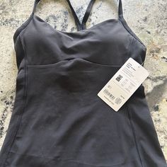 Nwt Athleta Vital Built-In Bra Tank. Paid $59, Missed Return Window Sleeveless Activewear With Built-in Padding For Light Exercise, Bra Friendly Tank Activewear For Training, Fitted Sporty Tank Top For Sports, Black Tank Sports Bra For Athleisure, Fitted Tank Top For Sports Athleisure, Running Racerback Top That Is Bra Friendly, Athleisure Tops With Built-in Padding For Workout, Tops With Built-in Padding For Light Exercise, Sporty Fitted Tank Top For Sports