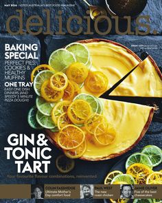 the cover of delicious house magazine with oranges and lime slices on it's pie