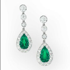 "Vintage-inspired 925 sterling silver lab-created emerald moissanite earring bridal Earrings, Emerald Earrings gift for woman Metal Purity:925 Metal weight5.6gram Stone: Moissanite stone weight:1.19ctw stone shape: pear stone clarity Clarity? : AAA Item finished color: Plated white gold and yellow gold > All products are made at our factory. so; you get the finest jewelry at factory prices without any extra cost of middlemen. > Pure 925 sterling silver jewelry. no alloy nothing. > All our products are made to order so you get a brand-new piece straight out of the factory. > All the craftsmen working at our factory are well experienced and strained to give you unmatched. > We do not use any type of chemical in our plating process to enhance the shine and luster of the metal which are harmfu Formal Emerald Earrings With Prong Setting, Green Diamond Bridal Earrings For Formal Occasions, Formal Green Diamond Bridal Earrings, Fine Jewelry Emerald Pear-shaped Earrings, Classic Emerald Pear-shaped Earrings, Emerald Drop Earrings For Formal Occasions, Pear-shaped Emerald Earrings Fine Jewelry, Pear-shaped Emerald Earrings For Anniversary, Green Diamond Dangle Earrings For Formal Occasions