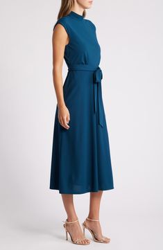 A front-tie closure brings definition to this mock-neck midi dress fashioned with a back cutout and cap sleeves for a touch of skin-bearing allure. 48 1/2" length Exposed back-zip closure Mock neck Cap sleeves Lined 100% polyester Dry clean Imported Formal A-line Midi Dress With Tie Back, Elegant Tie-back Midi Dress, Belted Midi Dress For Date Night, Spring Workwear Midi Dress With Tie Back, Elegant Halter Neck Midi Dress For Work, Chic Halter Neck Midi Dress For Work, Evening Knee-length Tie Back Midi Dress, Midi Length Tie Back Dress For Work, Summer Halter Neck Midi Dress For Work