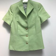 Valentino linen blazer perfect for spring.  Soft green with gold tone button front, winged collar, short sleeves and fully lined.  Made in Italy and tagged size 44.  Measures, 14" shoulder to shoulder, 8.5" sleeve, 36" bust, 30" waist, 38" hips and 22" shoulder to hem. For additional merchandise, please visit: https://www.ebay.com/str/eleganciatoo Classic Short Sleeve Outerwear For Formal Occasions, Classic Short Sleeve Outerwear For Formal Events, Classic Fitted Short Sleeve Outerwear, Formal Short Sleeve Outerwear For Fall, Classic Short Sleeve Fall Blazer, Wing Collar, Linen Crops, Linen Blazer, Green Shorts