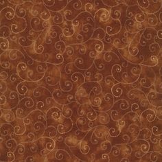 a brown area rug with swirls on it