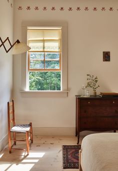 the bedroom is clean and ready to be used as a place for someone to relax