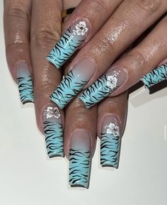 nails by: @nailedbyyans (on IG) Blue Tiger Print Nails, Blue Tiger Nails, Zebra Print Nails Y2k, Blue Grunge Nails, Zebra Print Nails Designs, Blue Zebra Nails, Tiger Stripe Nails, Sanrio 2000s, Tiger Nails