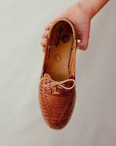 Embrace the convenience of slip-on style while maintaining an on-trend fashion sense. Our Essential Huaraches with laces are the perfect blend of comfort, versatility, and effortless style. Enhance your footwear collection and make a statement with these must-have sandals. Details 100% hand woven leather Synthetic leather insole Slip-on Artisan-made in Mexico