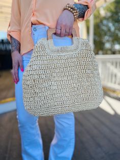 Meet our St. Tropez Straw Bag! This style is perfect for either a day at the beach or just as an accessory for your Vacay or Summer outfit. It includes a zipper closure, an interior pocket, and also a tan interior. This bag is lightweight with sturdy and durable handles, and is able to hold a lot of your necessities! *Snap the sides to create another look! Measurements: 17" L x 15" H Materials: 100% Paper Versatile Summer Pouch Bag, Lightweight Beige Tote Shoulder Bag, Beige Lightweight Tote Shoulder Bag, Versatile Rectangular Beach Shoulder Bag, Versatile Tote Hobo Bag For The Beach, Versatile Hobo Tote Bag For Vacation, Beach Bag Pouch With Top Carry Handle, Everyday Lightweight Natural Bags, Chic Summer Crochet Bag With Top Carry Handle