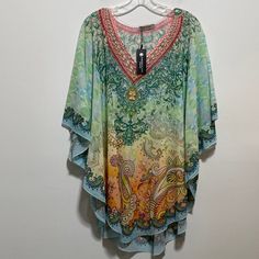 Beautiful Pastel Red, Green, Yellow, Blue Orange And Purple Kaftan Top New No Defects Polyester Multicolor Floral Print Short Sleeve Tunic, Blue Floral Print Beach Tunic, Festival Multicolor Printed Tunic, Multicolor Printed Tunic For Festival, Multicolor V-neck Tunic For Beachwear, Blue Floral Print Tunic For The Beach, Multicolor Bohemian Tunic For Beach Season, Summer Paisley Print Kaftan For Vacation, Summer Vacation Paisley Print Kaftan