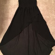 Black Size Large Never Worn Summer Formal High-low Hem Maxi Dress, Formal High-low Hem Maxi Dress For Summer, Black Chiffon Party Dress, Spring Black Maxi Dress With High-low Hem, Elegant Black Maxi Dress With High-low Hem, Solid Color Dressy Maxi Dress For Party, Casual Black Dresses For Party Season, Black Chiffon Dress With Asymmetrical Hem, Flowy Asymmetrical Hem Party Dress