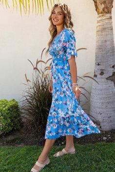 Blue Ruffle Short Sleeve Bohemian Flower Long Dress Bohemian Floral Ruffled Dress For Brunch, Bohemian Ruffled Floral Dress For Brunch, Blue Maxi Dress With Ditsy Floral Print For Summer, Blue Ditsy Floral Print Short Sleeve Maxi Dress, Blue Floral Print Short Sleeve Dress, Bohemian Floral Dress For Garden Party With Ruffle Hem, Bohemian Floral Dress With Ruffles For Vacation, Casual Blue Maxi Dress With Ditsy Floral Print, Blue Ditsy Floral Print Maxi Dress For Garden Party