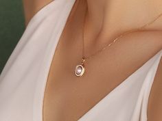 Oval Pearl Necklace PRODUCT INFORMATION DETAİLS *Metal Type: Solid 8K/14K/18K (White/Yellow/Rose) Gold *Center Gemstone: White (Pearl quality freshwater pearls with very high luster and smooth surface.) *Pearl Size : 7mm *Necklace Weight : 3 Gram *Side Stones :  1.10 mm *Chain Length Standard : 45 cm  ❥ Unless the Diamond option is purchased, your order will be sent with a zirconia stone.       GIFT  ❥ Your product will be sent in a nice high quality jewelry box. If you have a gift note at the t Oval Diamond Locket Necklace, Elegant Gold Necklace With Oval Pendant, Luxury Oval Necklace With Elegant Design, Delicate Yellow Gold Jewelry With Oval Pendant, Diamond Oval Pendant Necklace, Delicate Oval Pendant Yellow Gold Jewelry, Elegant Oval Link Locket Jewelry, White Gold Oval Necklace With Elegant Design, Oval White Gold Necklace With Elegant Design