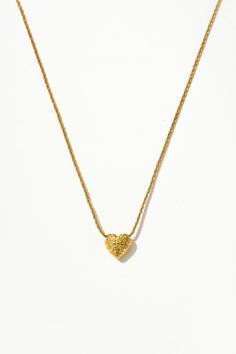 Wear your heart on your neckline! Crafted with love, this 18k gold necklace features a dazzling gold heart pendant. Whether you're spreading love vibes at brunch or stealing the show at date night, this necklace is sure to be your new fave accessory! Love Vibes, Gold Heart Pendant, 18k Gold Necklace, Heart Pendant Gold, Circular Economy, Heart On, Gold Heart, Heart Pendant Necklace, Heart Of Gold