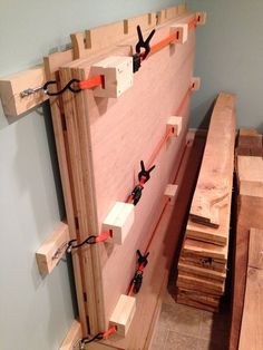 a wooden wall with some pieces of wood attached to it