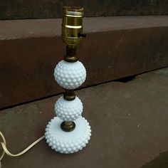 Vintage hobnail milk glass table or desk lamp . Lamp features 3 tiers of hobnail milk glass separated by metal columns. Made in the 1950s. Metal Columns, Milk Glass Lamp, Lamps Vintage, Glass Table Lamps, Vintage Table Lamp, Glass Table Lamp, The 1950s, Glass Table, Milk Glass