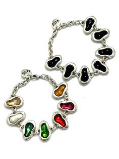 Tra-La-Rá Art Bracelet Made in Spain Length: 7.5” - Material: Silver plated zamac Metal Oyster Bracelet Jewelry For Party, Party Jewelry Metal Oyster Bracelet, Nickel Free Multicolor Metal Bracelets, Multicolor Nickel Free Metal Bracelets, Multicolor Metal Chain Bracelet, Black Enamel Metal Bracelet, Black Enamel Metal Bangle Bracelet, Black Enamel Metal Bangle, Elegant Multicolor Metal Chain Bracelet