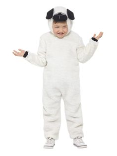 a little boy in a sheep costume is standing with his hands out to the side