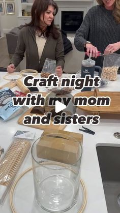 three women sitting at a table with some food on it and the words craft night with my mom and sisters