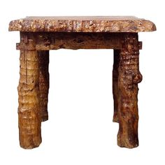 a small wooden table sitting on top of a white background