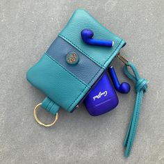 "Minimalist Wallet in 2 sizes. Slim, zip top Wallet or Organizer Bag is decorated with a Czech Glass Lotus Bead. Made from Super Quality Vegan Eco Leather. *Smaller size is 4 1/2\"wide and 3 1/2\"deep.Just right for Credit Credit Cards, Change or your EarPods . *Larger size is 6 1/2\"wide and 4 1/4\"deep. It's the Perfect size for glasses , Money, or Makeup or anything you need to organize .This size has a detachable Key Ring...so you could just carry this when you go to Yoga Class! Makes a grea Modern Coin Purse With Removable Pouch, Modern Compact Coin Purse For Personal Use, Compact Modern Coin Purse, Blue Rectangular Wallet With Key Clip, Blue Portable Wallets For Everyday Use, Compact Blue Coin Purse For Everyday Use, Portable Blue Wallets, Rectangular Zipper Pouch Card Holder For Personal Use, Modern Zipper Coin Purse For Personal Use