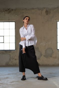 "Introducing our Handcrafted Merino Wool Drop Crotch Pants - Your Ultimate Statement in Luxury and Style! Elevate your fashion game with our meticulously crafted, 100% Merino Cool Wool Drop Crotch Pants, where innovation meets elegance. Designed for those who appreciate the avant-garde, urban, and bold fashion sensibility, these pants are a true embodiment of style and comfort. 🌟 Key Features: 🧶 Luxurious Merino Cool Wool: Crafted from high-quality Merino Cool Wool, our pants exude luxury and Women Baggy Pants, Cotton Harem Pants, Black Harem Pants, Drop Crotch Pants, Harem Pants Women, Slow Fashion Movement, Fabric Ideas, Winter Boho, Winter Pants