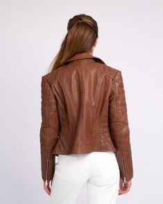 Discover the ultimate style and quality with the Amsterdam Heritage women's leather jacket Munroe Meticulously crafted from premium lambskin by our artisans, this jacket is designed for the modern woman. With its sleek and classic biker silhouette, it exudes confidence and sophistication. The leather construction offers both comfort and durability, making it the ideal choice for the fashion-forward woman on the go. Featuring an asymmetric front closure, snap button pocket, zipper cuffs and quilt Womens Leather Biker Jacket, Classic Leather Jacket, Leather Jacket Style, Hit The Road, Leather Biker Jacket, Leather Jackets Women, Classic Leather, Biker Jacket, Jacket Style