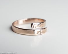 Engraved personalized name ring; wedding bands for women... Also perfect promise ring for your special woman ♡ ► FEATURES;Material Options: 14k Rose Gold, 14k Yellow Gold, 14k White GoldSize: All ring sizes are available► HOW TO ORDER;Please select your preffered size and material from the menu while adding to card.► PROCESSING & SHIPPING❥Your order will be handmade in 3-6 business days.❥Shipping time is 2-5 days to US.❥Please check the shipping times to other countries by writing your count Adjustable Rings For Wedding And Mother's Day, Engraved Rose Gold Rings For Personalized Gift, Personalized Engraved Rose Gold Ring, Rose Gold Engraved Ring With Name For Gift, Rose Gold Engraved Name Ring As Gift, Rose Gold Engraved Name Ring For Gift, Personalized Rose Gold Engraved Ring For Promise, Rose Gold Name Jewelry For Promise, Adjustable Rose Gold Stackable Rings For Wedding