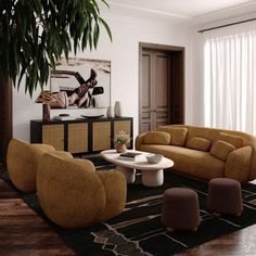 a living room filled with furniture and a large potted plant in the middle of the room