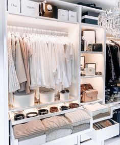 an organized closet with clothes and accessories