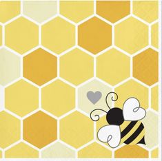 a yellow and black bee with hearts on it's chest, sitting in front of a honeycomb