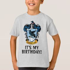 a young boy wearing a t - shirt that says, it's my birthday