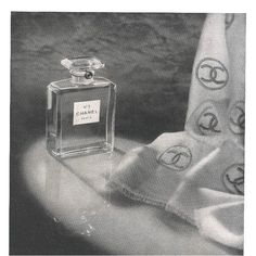 RARE FIND! This is a matted French advertisement print for Chanel No.5 perfume. It originally appeared in a French magazine that dates to 1946. It is original to 1946 and NOT a recent reproduction print. The Chanel bottle was designed by Coco Chanel herself and is now iconic, recognizable and classic in it simplicity and sophistication. Amongst many Chanel ads this one is a standout! This advertisement is unusual and limited in circulation. A spotlight highlights the perfume. Note the Chanel sca Old Chanel, Chanel Advertisement, French Advertisement, Chanel Bottle, Chanel No 5 Perfume, Chanel Ad, Parfum Chanel, Chanel Scarf, French Magazine