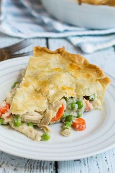 a slice of chicken pot pie on a plate