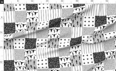 a black and white checkerboard pattern with crosses on the side, as if it was made from fabric