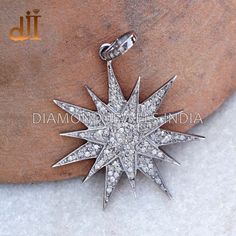 "Solid 925 Silver Pave Diamond Handmade Starburst 18\" Chain Necklace Starburst Jewelry PEMJ-1298 925 Silver Pendant. Pave Diamond Star Pendant. Starburst Pendant Jewelry. Pave Diamond Jewelry. 31x31 MM Star Size. 18\" Chain Necklace. Here Are Some Amazing Ways To Take Care Of Your Precious Diamond Jewelry. Always. * Apply lotion, cosmetics, hairspray, and perfume before dressing in jewelry. * When undressing, wipe each piece with a clean soft cloth to remove oils and perspiration. * Store in a fabric-lined box, separately or individually-wrapped in tissue to prevent scratches. Never: * Never wear jewelry when doing physical work such as housekeeping, gardening, or exercise. * Never expose jewelry or household cleaning products. * Never expose jewelry to chlorine swimming pools or hot tubs Luxury Diamond Starburst Necklace, Sterling Silver Star Gemstone Jewelry, Luxury Sterling Silver Star Charm Jewelry, Luxury Sterling Silver Star Jewelry, Luxury Sterling Silver Jewelry With Star Charm, Fine Jewelry Star Shaped Sterling Silver, Fine Jewelry Sterling Silver Star Necklace, Fine Jewelry Sterling Silver Star Shaped Necklace, Dazzling Silver Star Jewelry