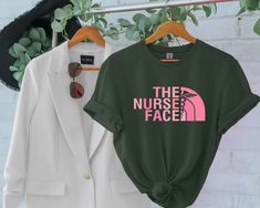 The Nurse Face Shirt, Nurse Gift, Shirt for Nurse, Nurse Shirt Gift, Gift for Nurse, RN Nurse Shirt, Nurse Hoodie, Shirt Gift Product Features: - We have a size chart on our listing photos -  All our Heather Colors are cotton/polyester blend and they are super comfy soft! - All our simple color ones like White and Black are 100% Cotton - Soft and High-Quality Fabric - Pre-shrunk - Sueded Jersey - Taped shoulder-to-shoulder - Tear away label - Side Seamed - Retail fit How Do I Order 1- Please rev Neuro Nurse Shirt, Night Shift Nurse Tshirt, White Letter Print T-shirt For Nursing, Pre-shrunk Nursing T-shirt With Crew Neck, Cotton Crew Neck Nursing T-shirt, Nursing Hoodie, Nursing Tshirts, Simple Colors, Nursing Shirts