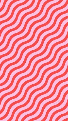 a pink and red pattern with wavy lines