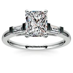 Refined lines contrast beautifully with sparkling diamonds, making the Baguette Radiant Diamond Ring in White Gold a great choice when it comes to popping the question, or simply indulging the love of your life! http://www.brilliance.com/engagement-rings/baguette-diamond-ring-white-gold-1/3-ctw Baguette Cut Diamond Ring With Side Stones, Fine Jewelry With Baguette Cut Side Stones, Baguette Cut Side Stones Jewelry For Anniversary, Classic Rectangular Diamond Ring With Baguette Diamonds, Luxury Baguette Cut Rings With Side Stones, Classic Rectangular Baguette Diamond Ring, Classic Diamond Ring With Baguette Cut And Side Stones, Classic Baguette Cut Diamond Ring With Side Stones, White Gold Baguette-cut Jewelry With Side Stones