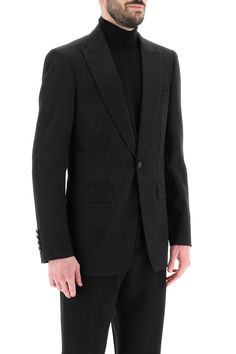 This tuxedo jacket is a mix of classic elegance and modern style, perfect for the man who appreciates subtle details. It's designed for a sleek fit, offering a confident and sophisticated look for any special occasion. Crafted with care in Italy, this jacket is both stylish and comfortable, making it a staple in any wardrobe. Made from a luxurious blend of wool and cotton cady Features a unique tone-on-tone jacquard coat of arms design Satin-covered peaked lapels add a touch of refinement Comfor Jacquard Coat, Jacquard Jacket, Tuxedo Jacket, Leather Cap, Sneaker Heels, Denim Pant, Roberto Cavalli, Coat Of Arms, Denim Top