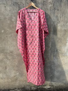 This Beautiful Indian Cotton Caftan or can be called as Tunic is made with super fine quality cotton and designs have been crafted by Hand Prints. Measurements :- Size - Free Size Length -121  CM / 48  Inches                127 CM / 50 Inches                 132 CM / 52 Inches                 138 Cm/ 54 Inches Bust/chest size - 87 CM/ 34 Inches Fabric - 100% Hand Block Cotton Pattern - Floral Kaftan has Adjustable Drawstring Waist to loose or tight , Kaftan has V Shape Neck Which is 8" Inches De Eid Multicolor Block Print Kaftan, Pink Tunic For Eid, Traditional Pink Kaftan With Dabka, Traditional Pink Dabka Kaftan, Traditional Pink Kaftan For Festivals, Bohemian Pink V-neck Kurta, Festive Tunic Kaftan With Block Print, Festive Block Print Tunic Kaftan, Festive Block Print Kaftan Tunic