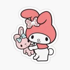 a sticker with an image of a hello kitty holding a little bunny on it's back