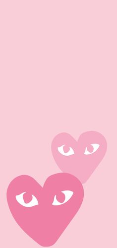 two pink hearts with eyes in the middle