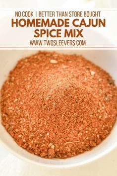 homemade cajun spice mix in a white bowl with text overlay that reads, no look i better than store bought homemade cajun spice mix