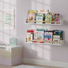 two bookshelves with children's books on them in a child's room