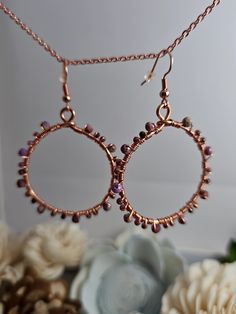 Look at these beautiful copper earrings with faceted Rhodochrosite beads tightly wire wrapped around the frame! These hoops are about 2 inches in diameter and dangle at the perfect length.  ✨️For further questions or inquiries, please send me a message & I will respond as soon as possible✨️ Diy Copper Earrings, Copper Wire Wrapped Round Hoop Earrings, Wire Wrapped Copper Hoop Earrings, Handmade Copper Wire Hoop Earrings, Small Copper Wire Wrapped Hoop Earrings, Beaded Copper Hoop Earrings As Gift, Ear Art, Copper Diy, Earring Ideas