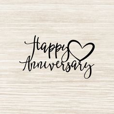 happy anniversary card with hearts on wood background