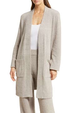 Maximize the coziness of your weekend look in this longline cardigan complete with roomy front pockets. 37 1/2" length (size Medium)   Long sleeves   Front patch pockets   70% recycled polyester, 30% polyester   Machine wash, tumble dry   Imported    This garment was made in a factory that supports women-worker empowerment through HERproject, which creates partnerships to enable workplace-based interventions on health, financial inclusion and gender equality Cheap Casual Forever 21 Cardigan, Soft Texture Relaxed Fit Outerwear For Loungewear, Relaxed Fit Soft Outerwear For Loungewear, Oversized Outerwear With Side Pockets For Casual Wear, Cozy Sweater Coat With Pockets For Everyday, Spring Outerwear With Pockets, Cozy Fit Outerwear With Pockets For Loungewear, Relaxed Fit Open Front Cardigan With Pockets, Comfortable Spring Outerwear With Pockets